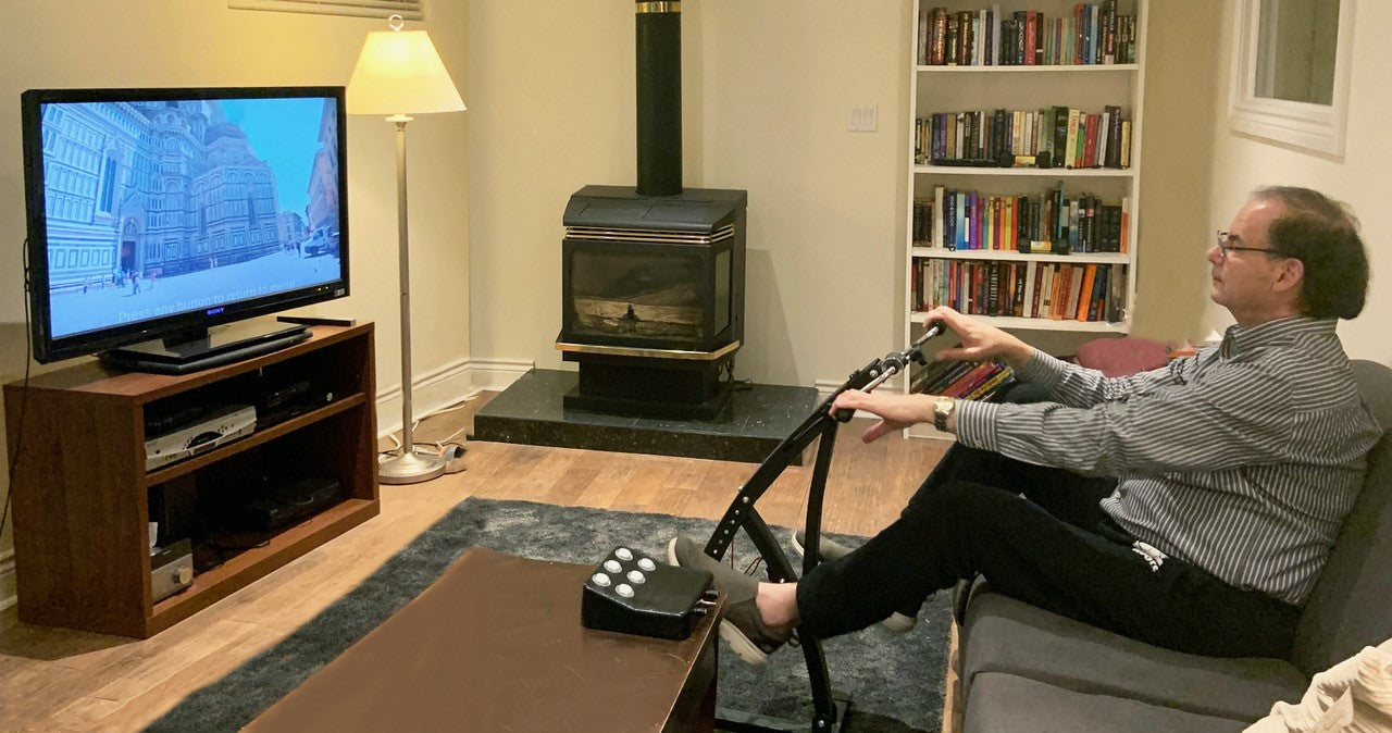Man using 2RaceWithMe in a living room